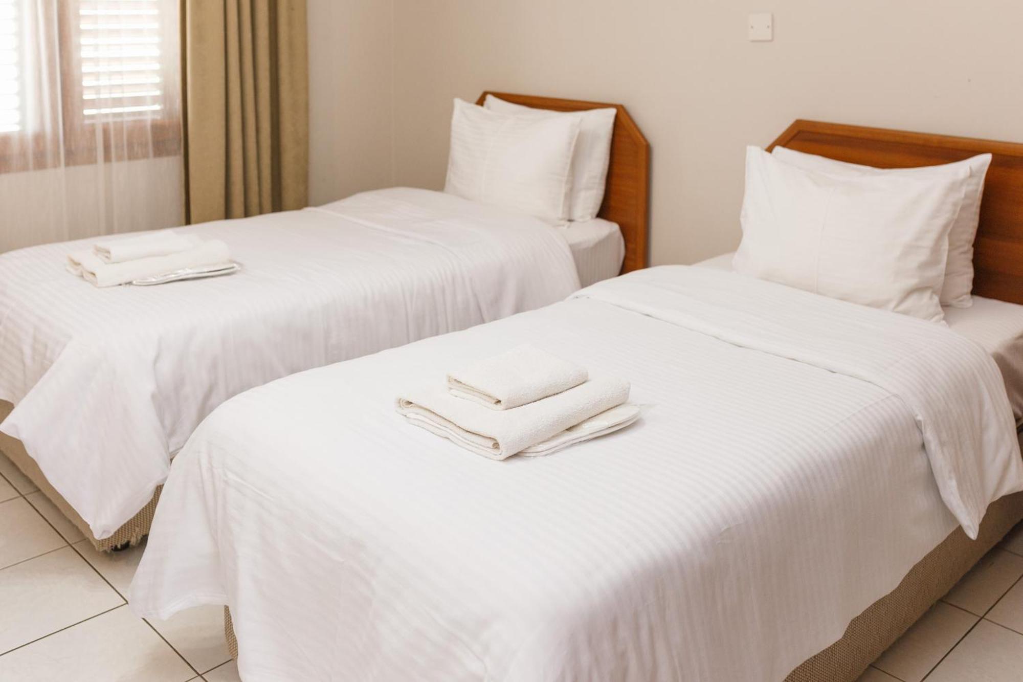 Homelike Guest House Cirénia Quarto foto