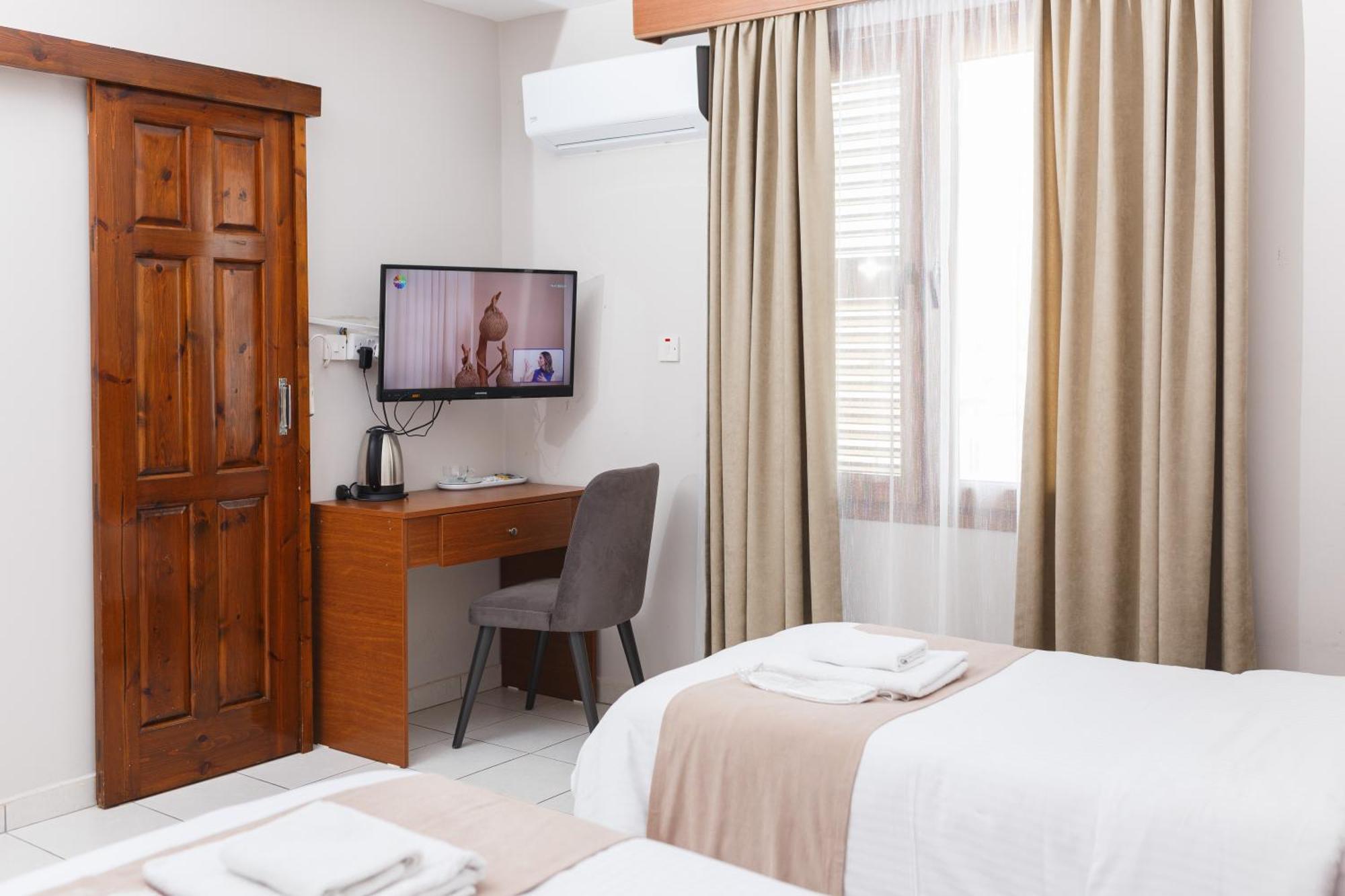 Homelike Guest House Cirénia Quarto foto