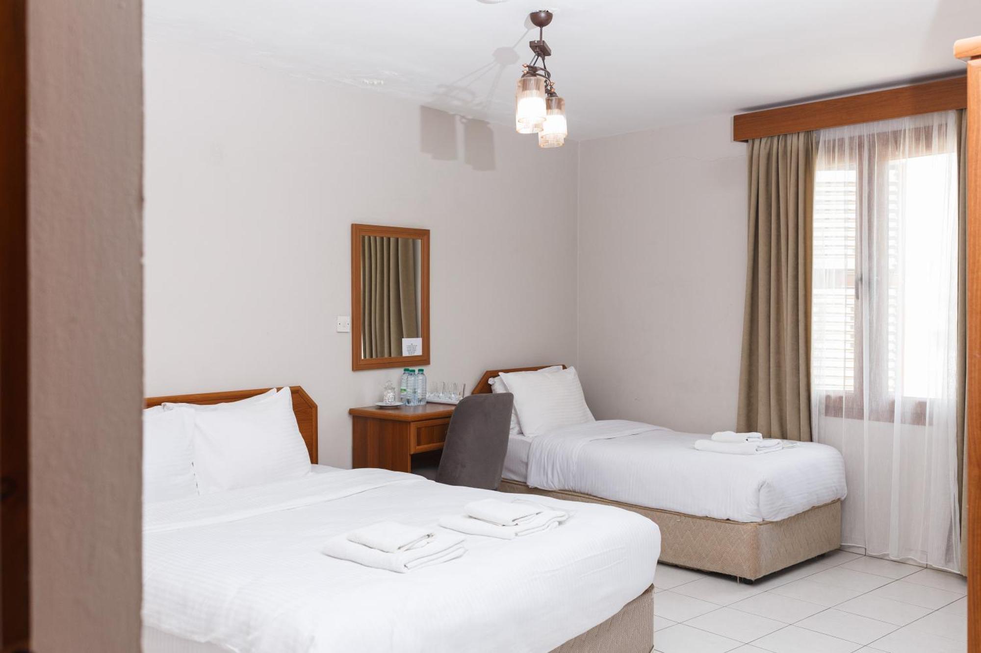 Homelike Guest House Cirénia Quarto foto