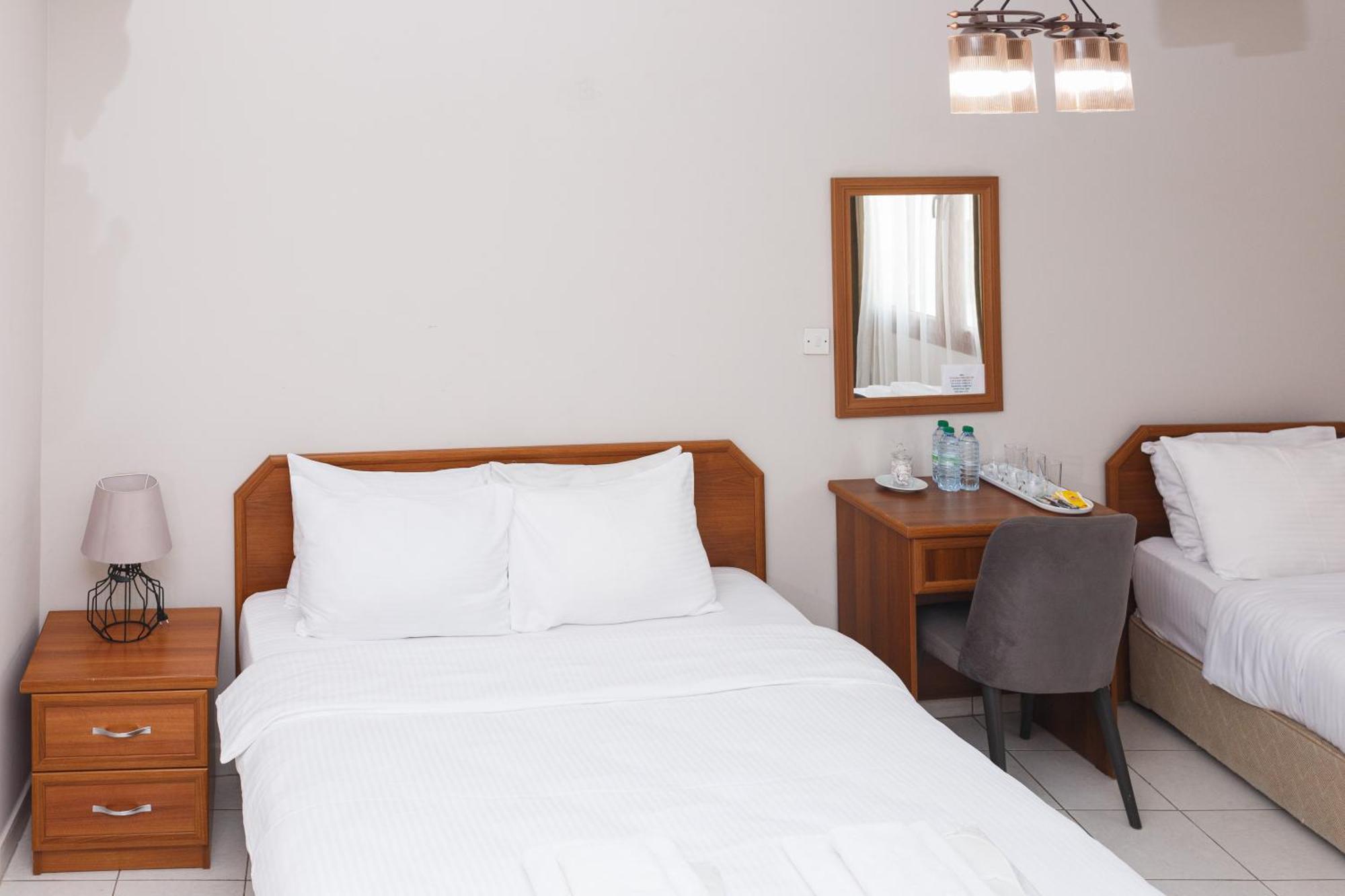 Homelike Guest House Cirénia Quarto foto